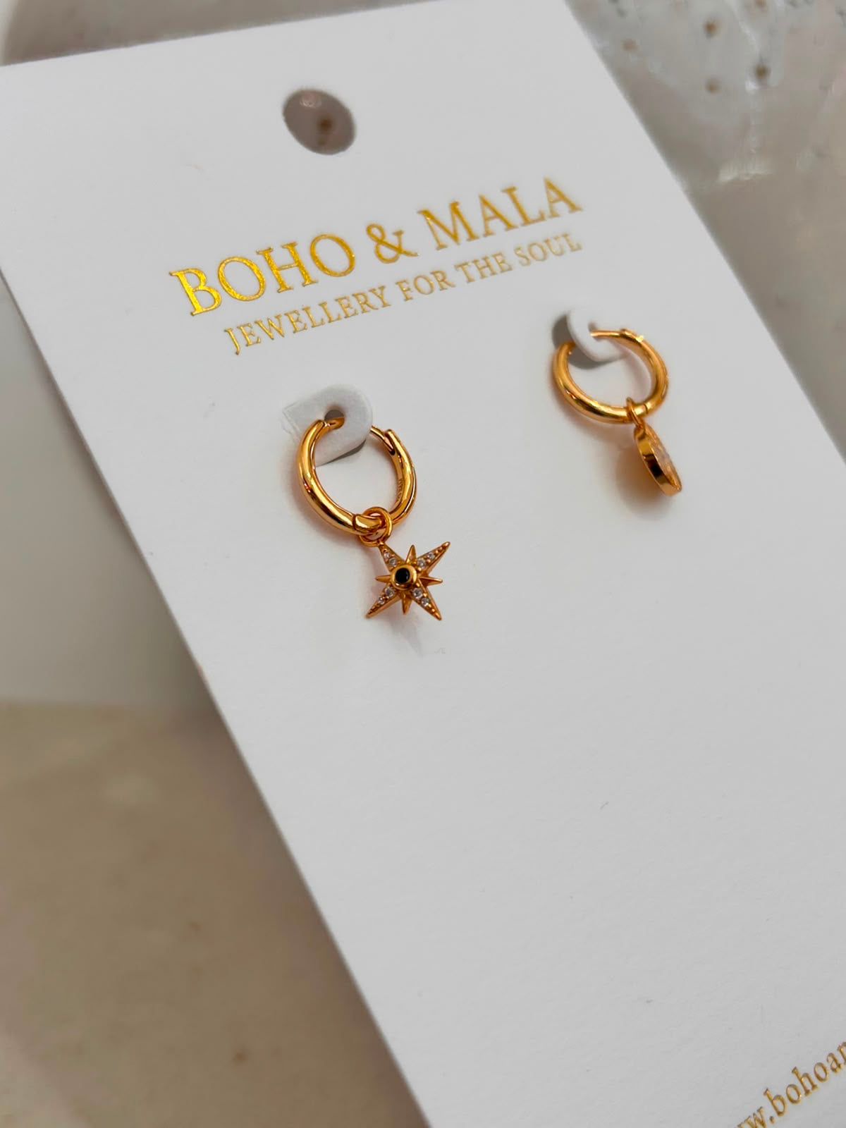 
                  
                    Celeste Sun & Star Huggie Earrings
                  
                