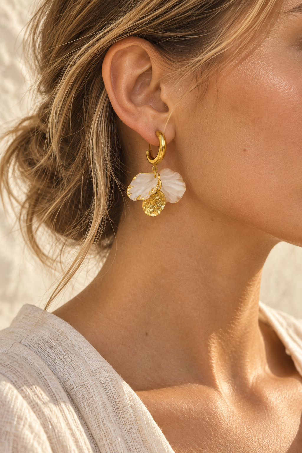 Model wearing Flora shell bloom hoop earring
