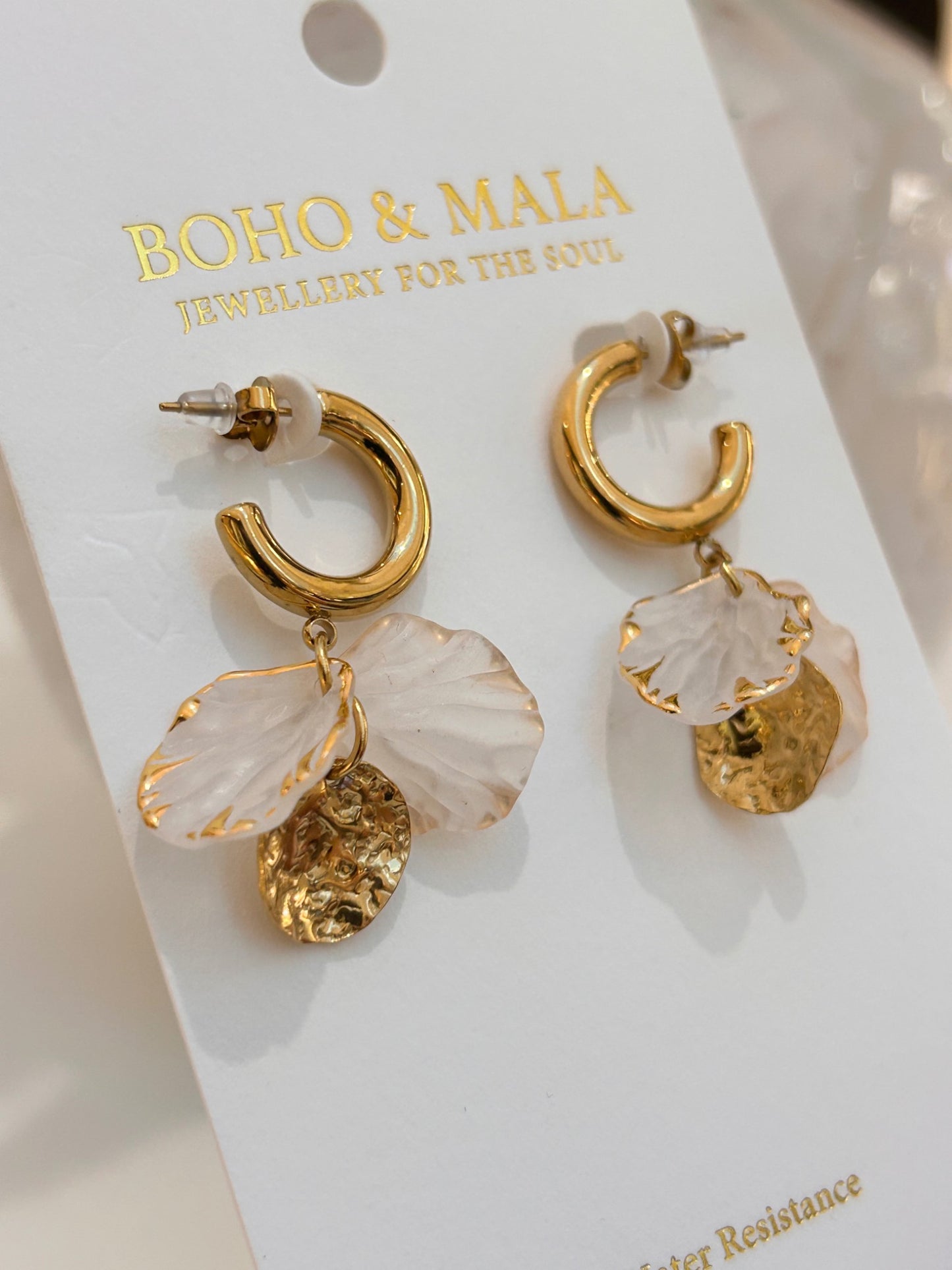
                  
                    Flora Shell Bloom Hoops on Boho & Mala display card
                  
                