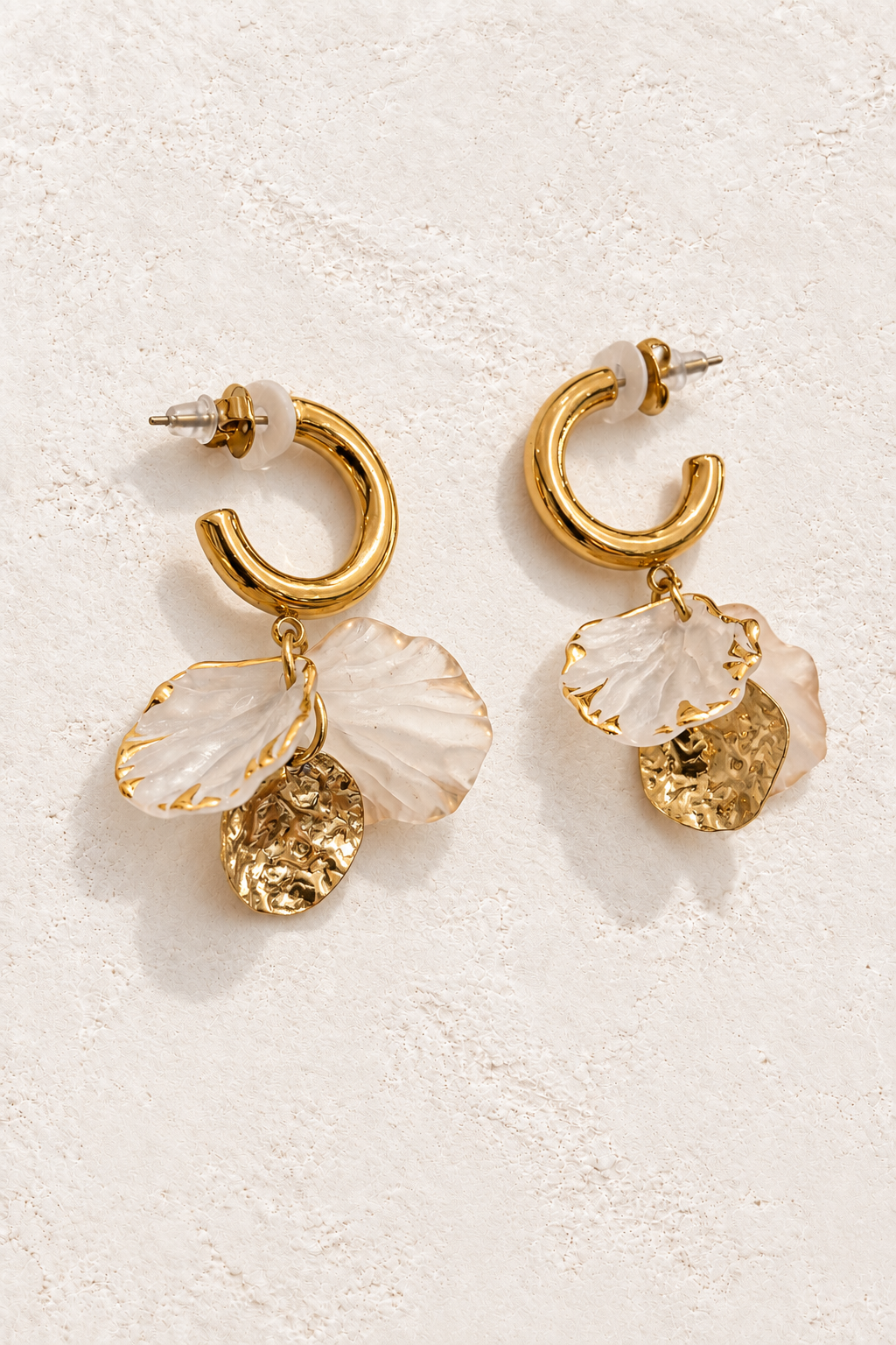 Flora Shell Bloom Hoops on warm ivory textured background