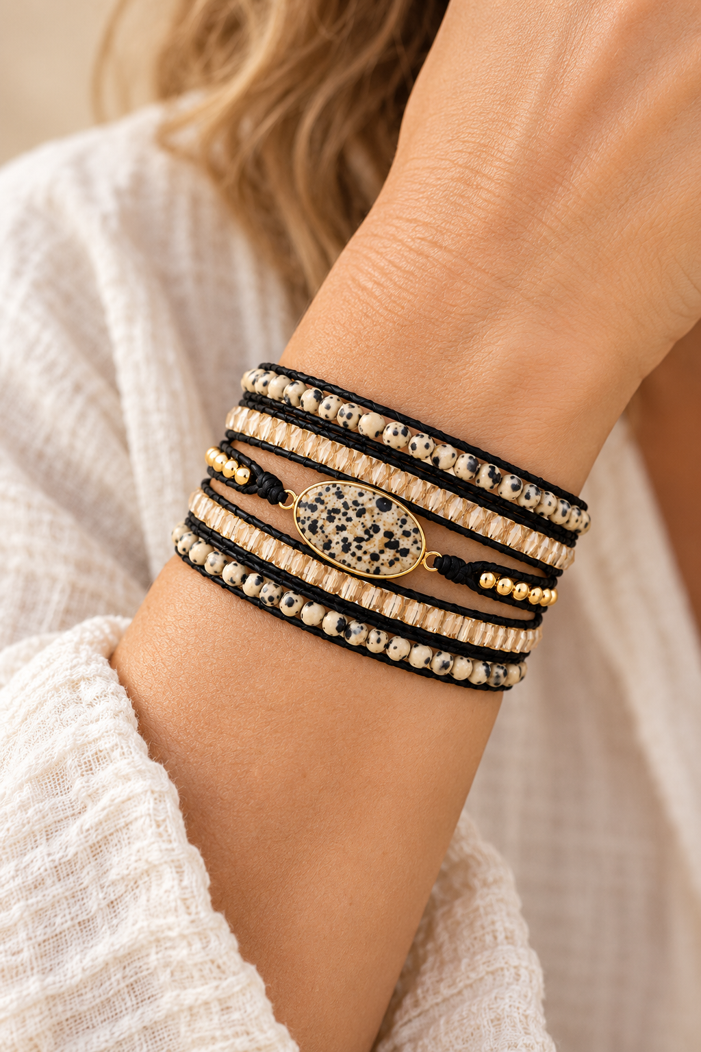 
                  
                    Handmade Dalmatian Jasper Mixed Natural Stone 5 Wrap Bracelet worn on a model's wrist
                  
                