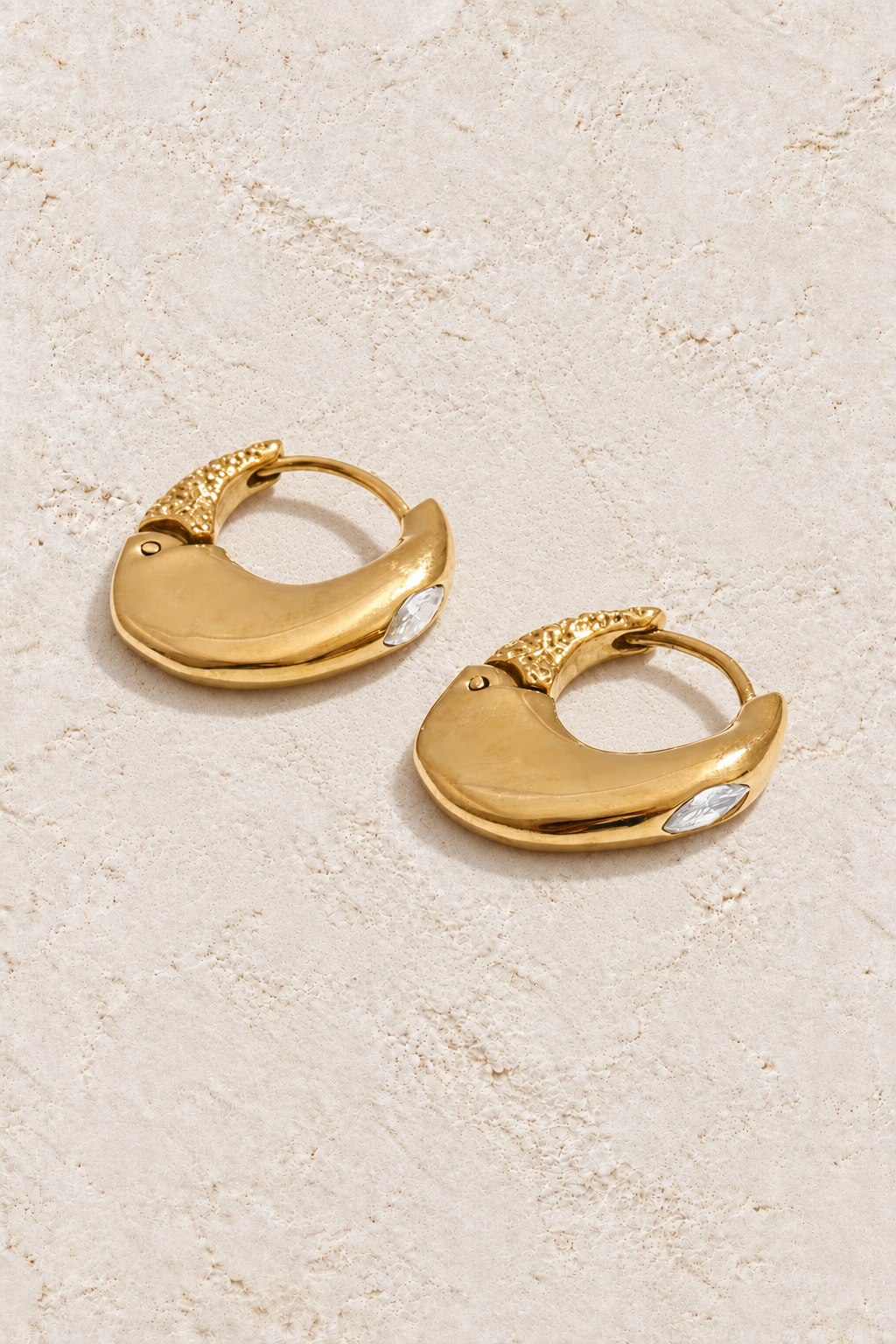 Gold Marquise Inset Crystal Hoop Earrings on cream plaster