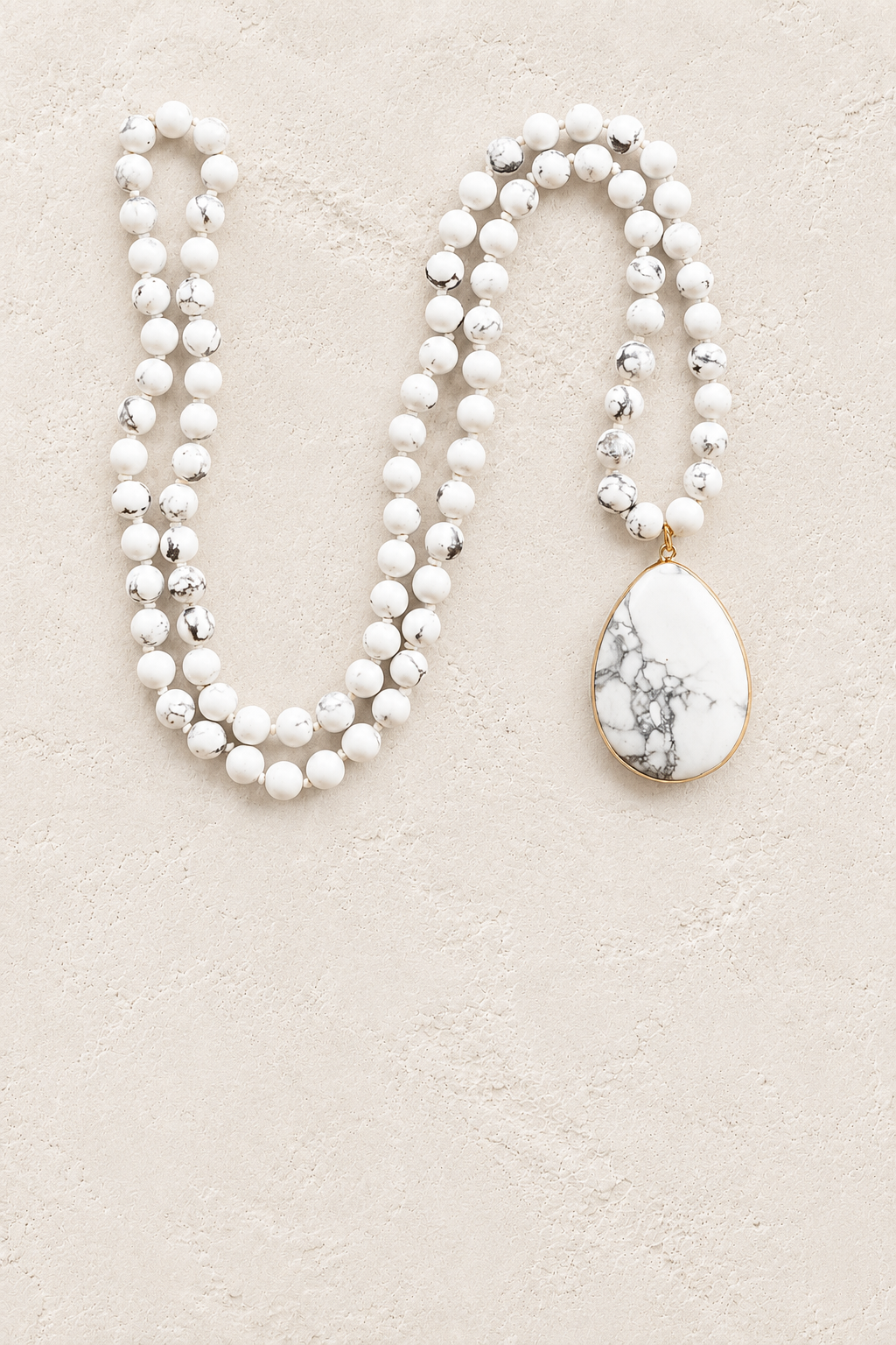 Howlite Tribal Necklace on warm ivory plaster background