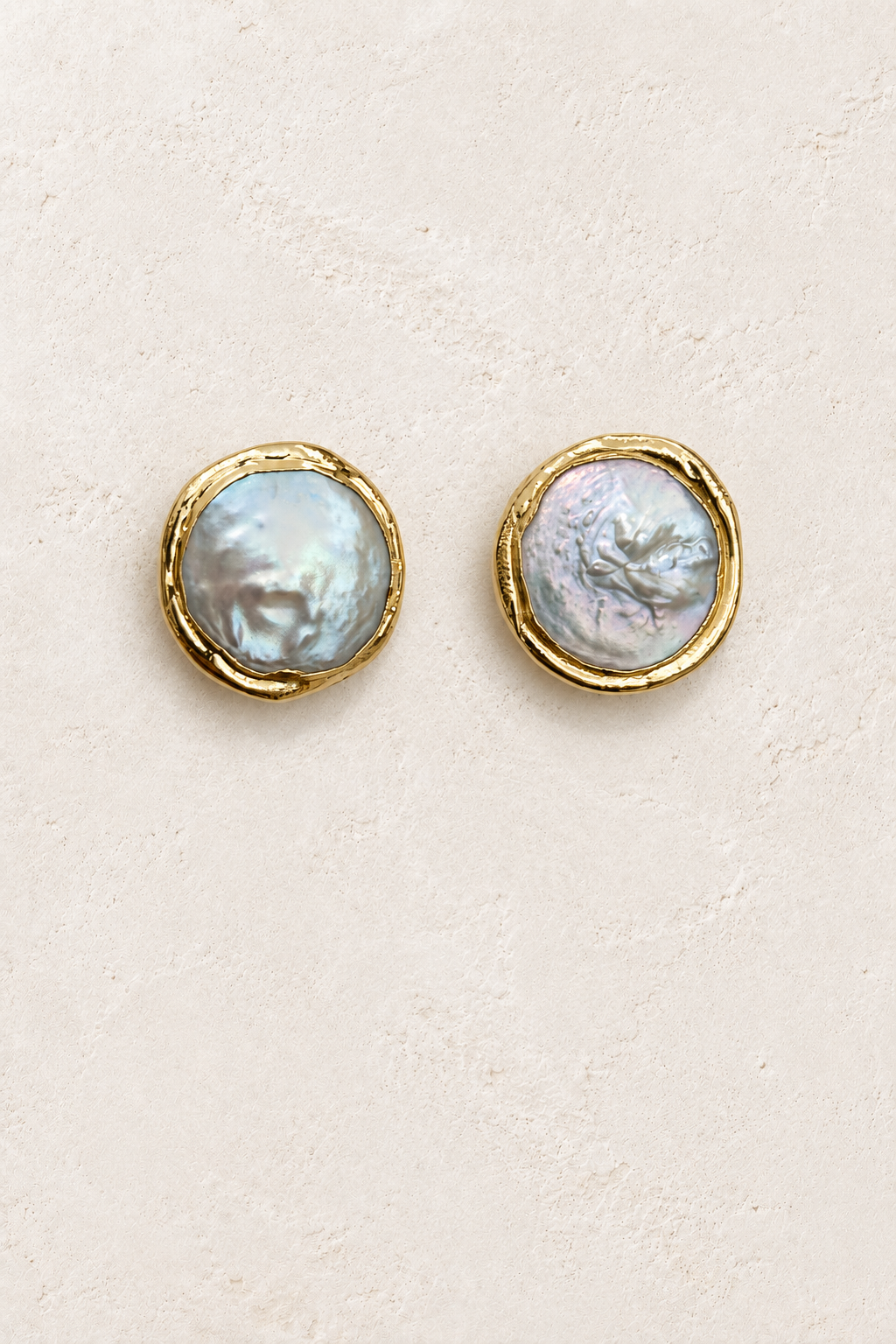 Mirelle Gold Coin Pearl Studs on cream plaster background