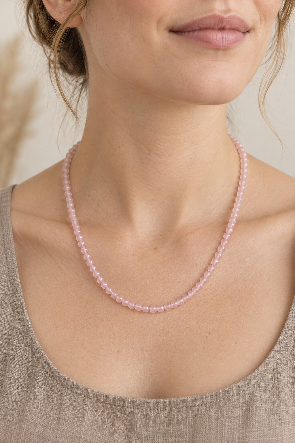 Boho model wearing the Mireya Rose Quartz faceted gemstone bead necklace