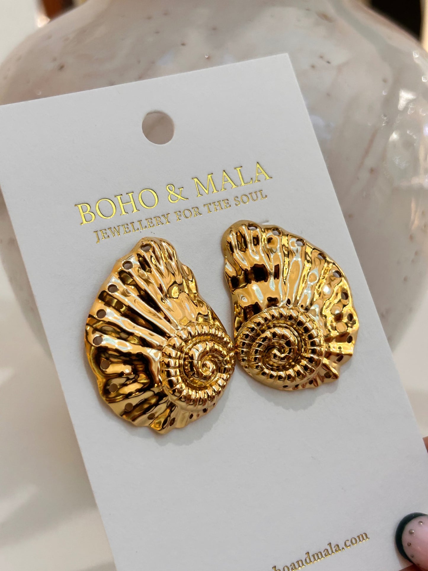 
                  
                    Nautilus Statement Studs on Boho & Mala display card
                  
                