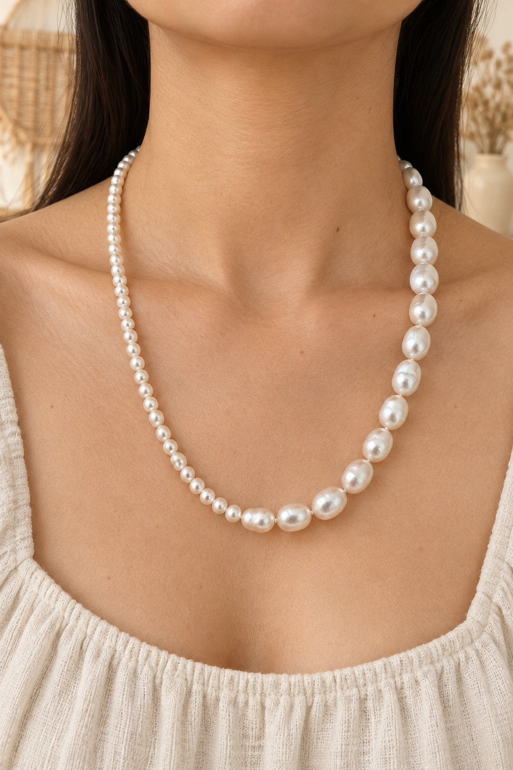 Boho model wearing the Odette graduated freshwater pearl necklace