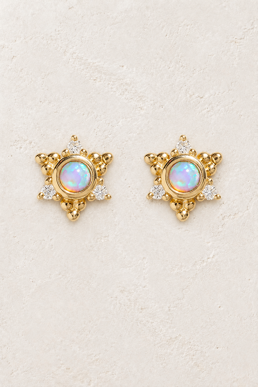 Gold opal celestial star stud earrings