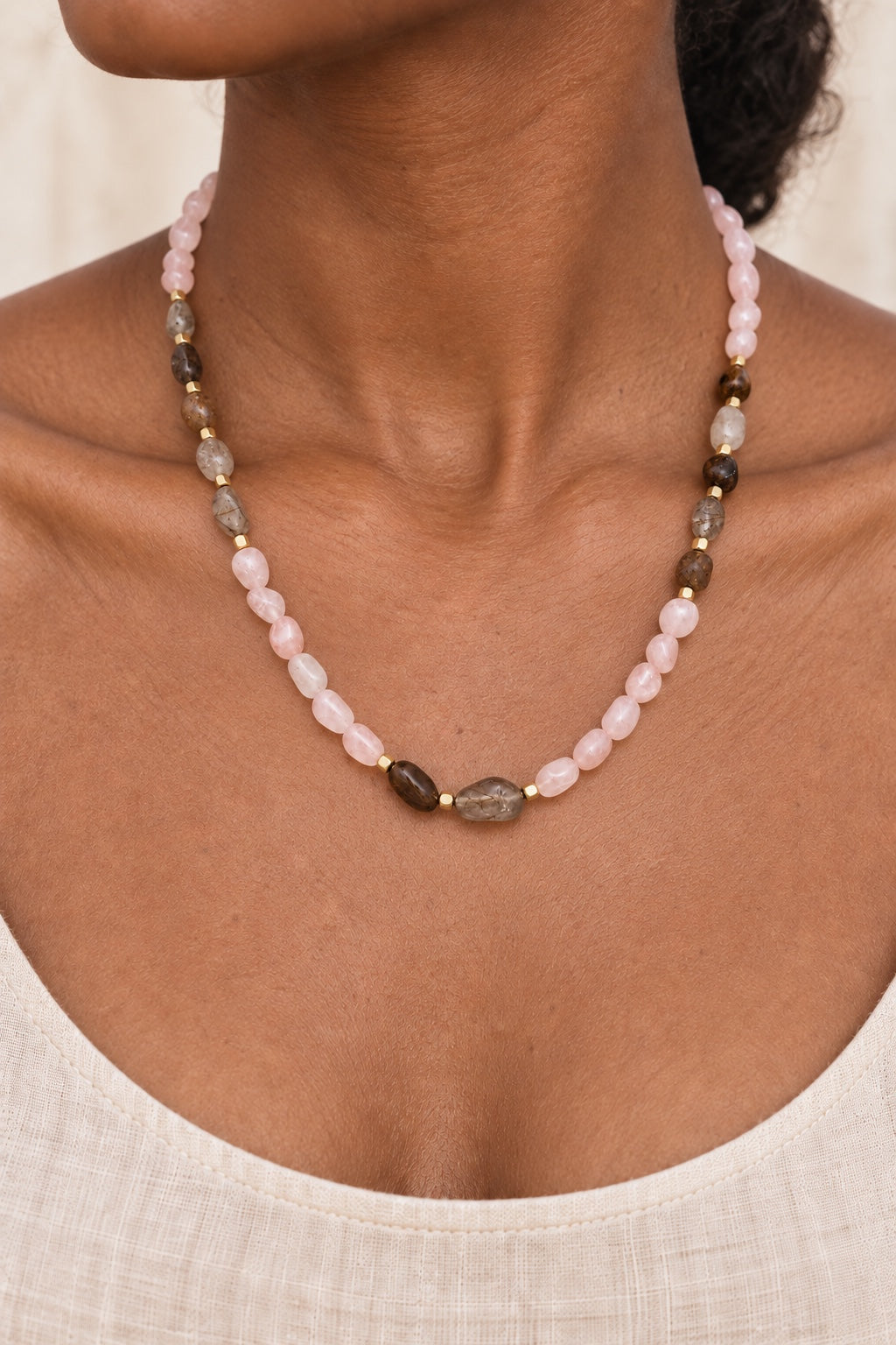 Model wearing the Roselune Rose Quartz and mixed gemstone necklace