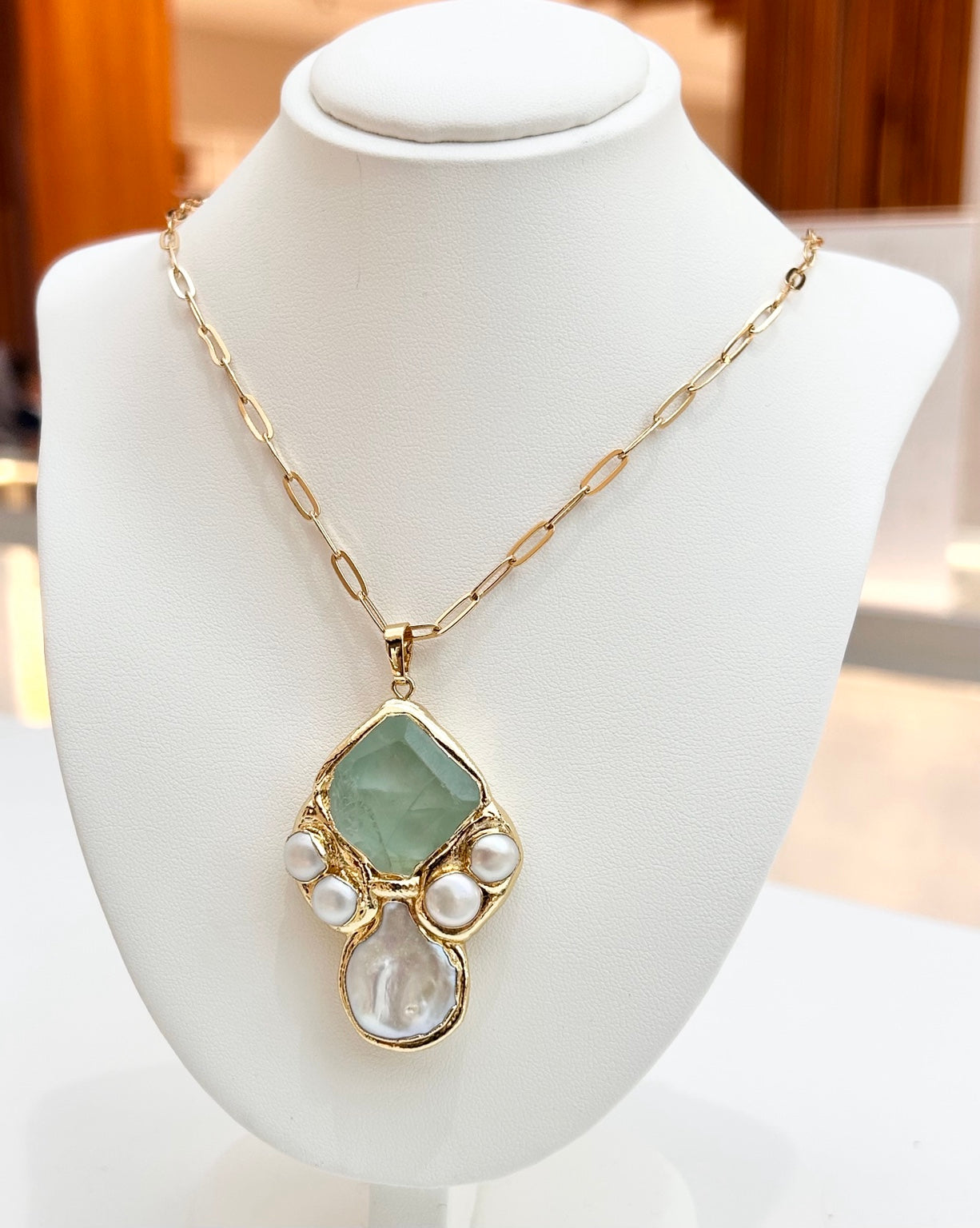 
                  
                    Seravelle Green Jade tarnish-free necklace displayed on a jewellery bust
                  
                