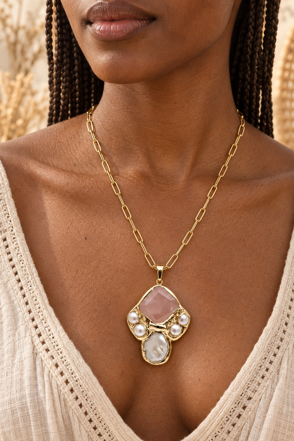 Boho model wearing the Seravelle Rose Quartz gold-plated statement necklace