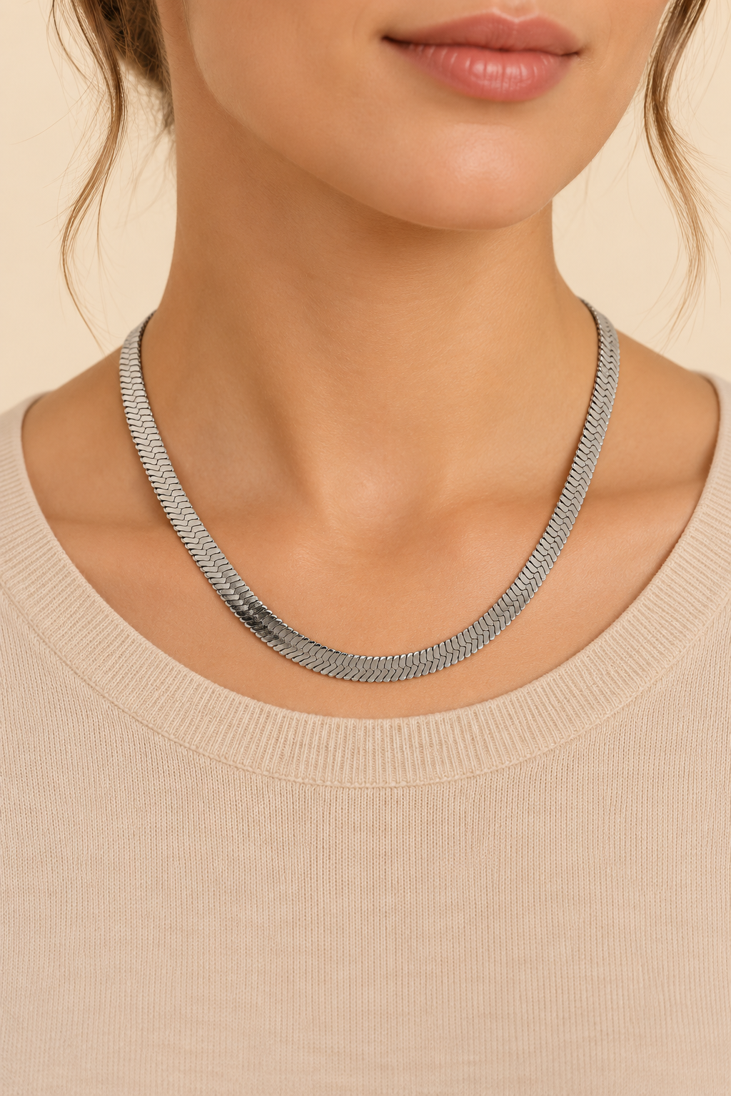 Silver Snake Chain Necklace worn by model, showing flat silver herringbone links
