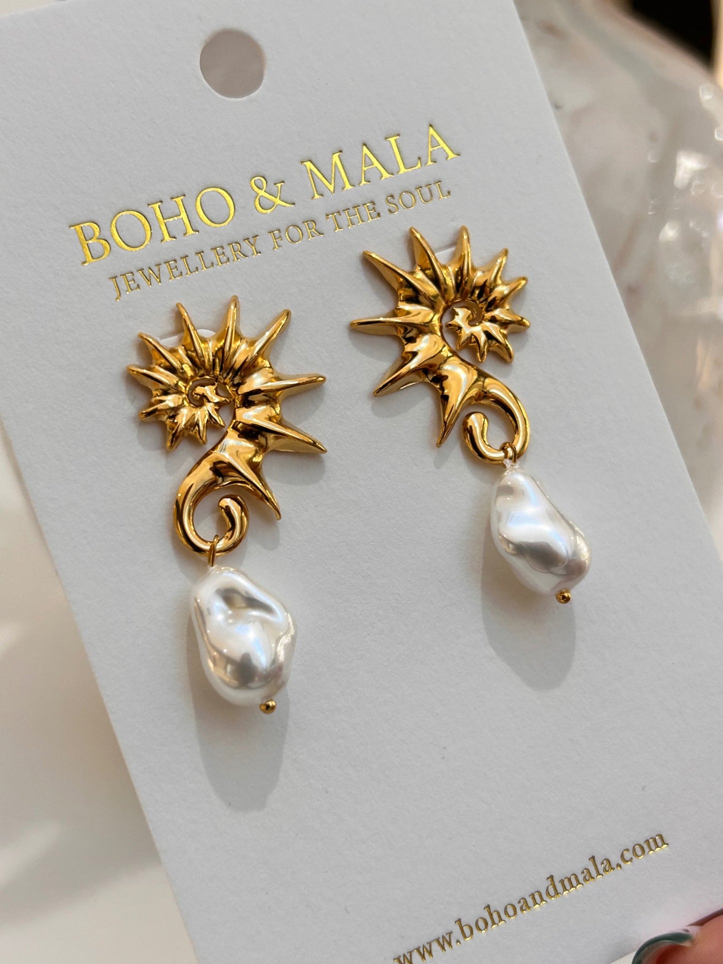 
                  
                    Solana Pearl Sunburst Drops on Boho & Mala display card
                  
                