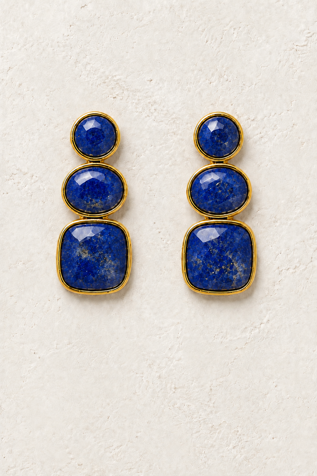 Solenne Lapis Lazuli genuine gemstone stud drop earrings on cream textured background