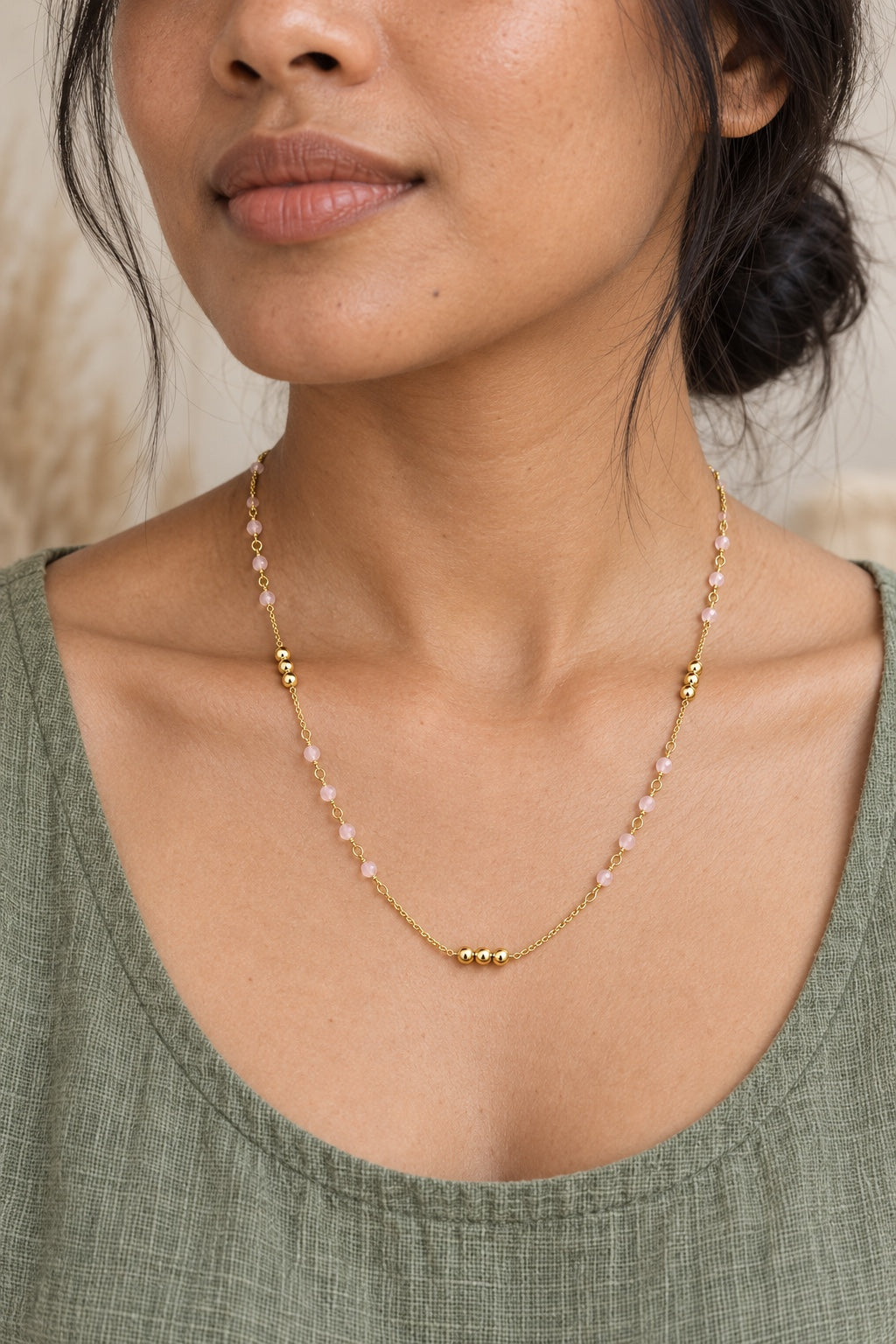 Boho model wearing the Sorella Rose Quartz gold-plated necklace