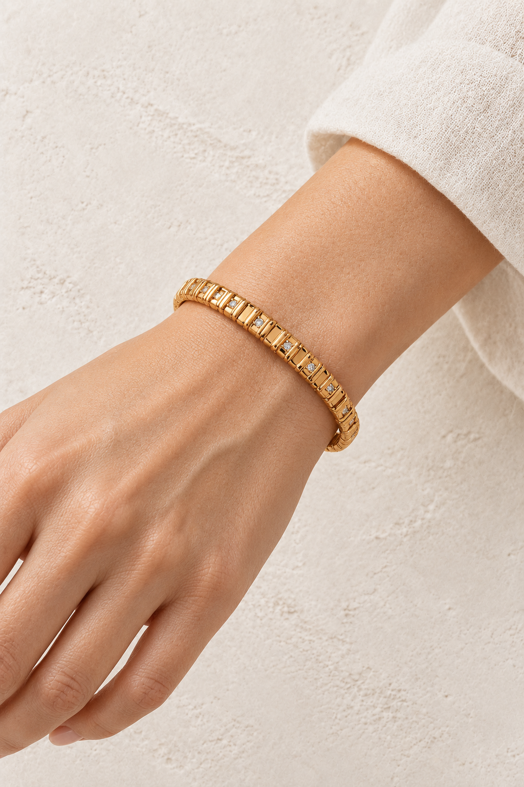 
                  
                    Model wearing Talia Gold Textured Bangle
                  
                