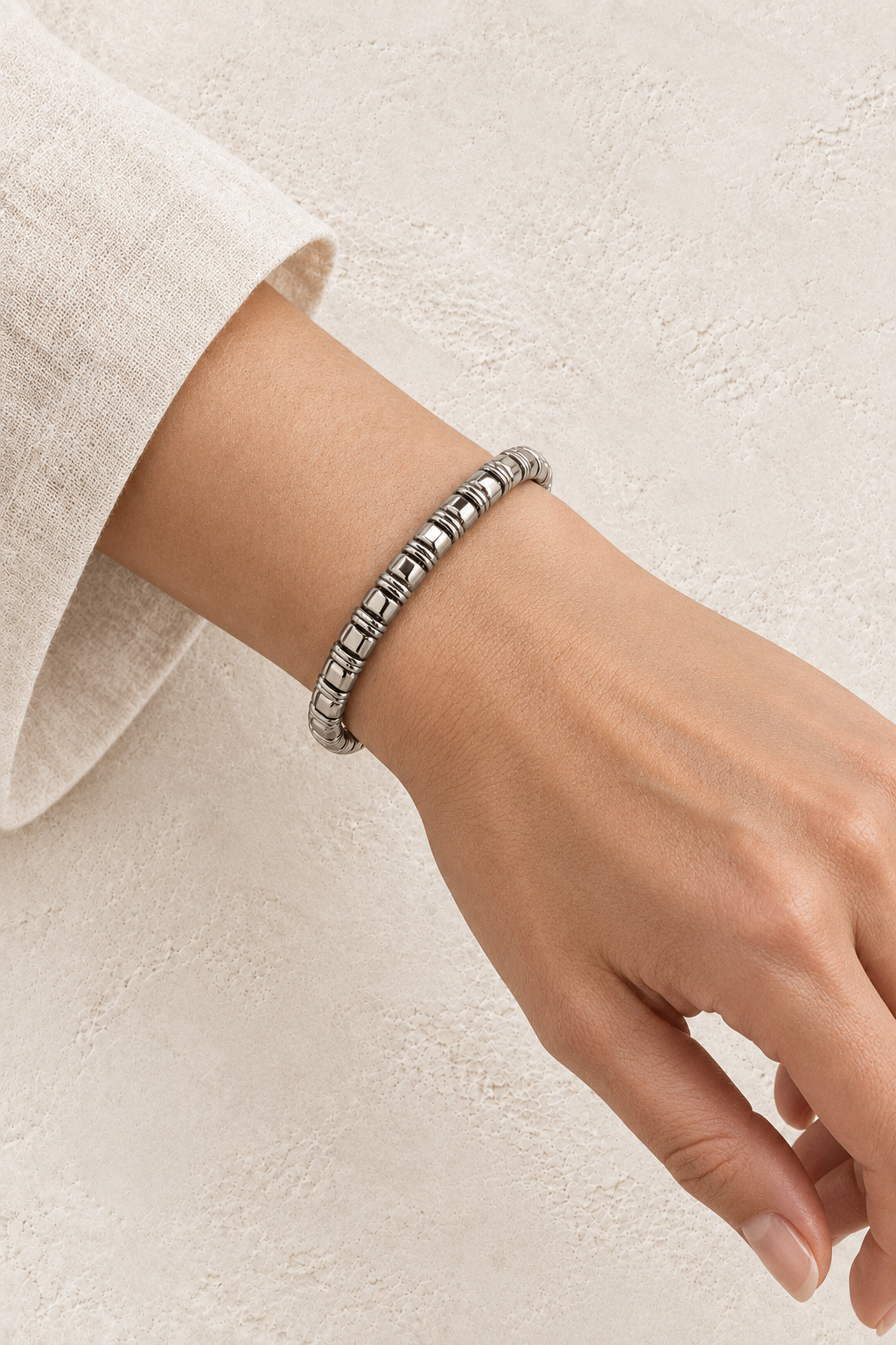 
                  
                    Model wearing Talia Silver Textured Bangle
                  
                