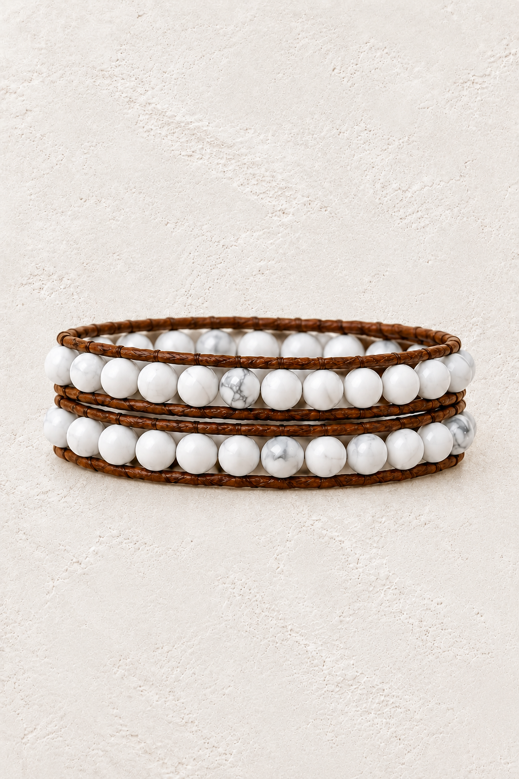 Handmade Howlite Mixed Natural Stone Wrap Bracelet on the Boho & Mala warm-white textured background