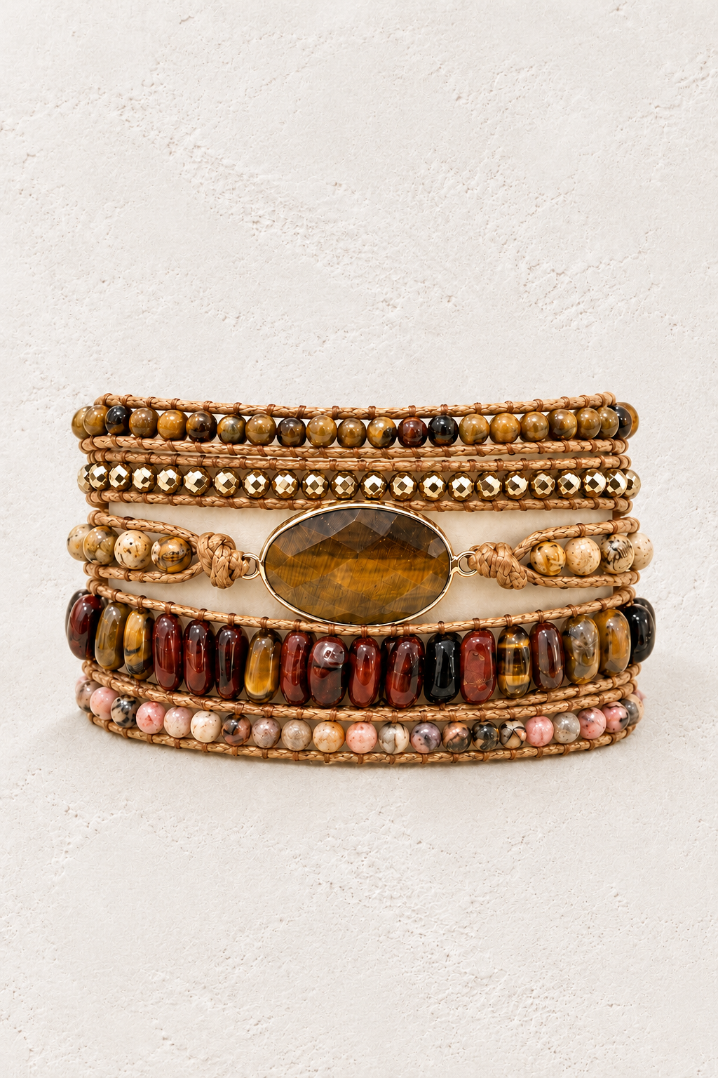 
                  
                    Handmade Tiger’s Eye Mixed Natural Stone Wrap Bracelet on the Boho & Mala warm-white textured background
                  
                