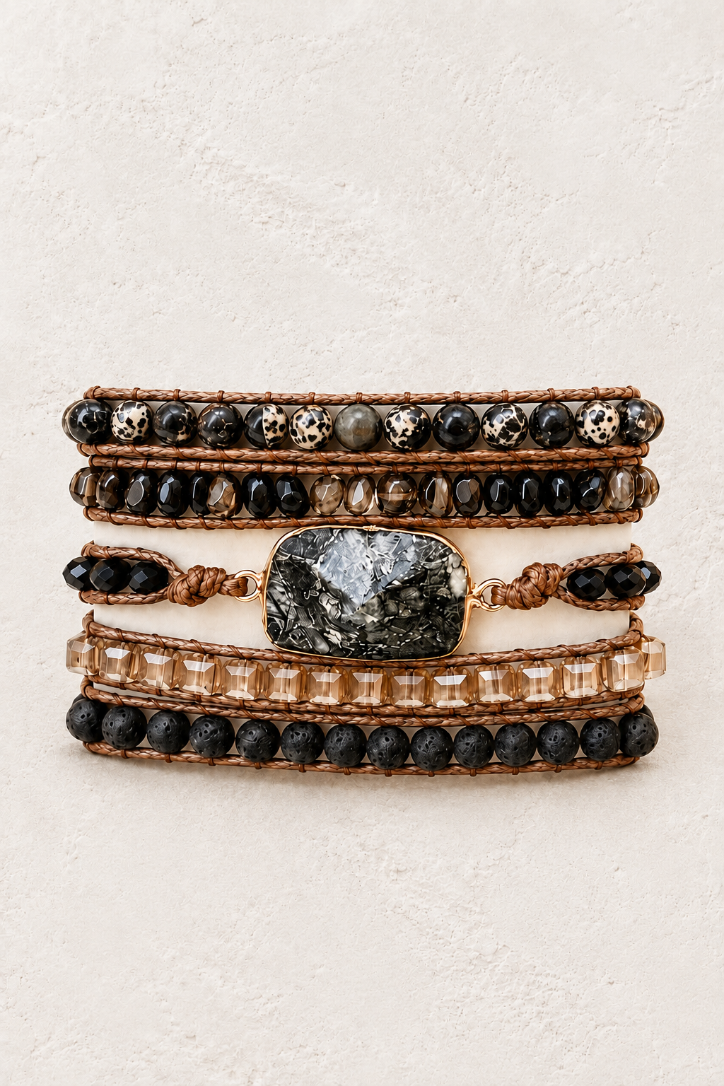 Handmade Black Onyx & Dalmatian Jasper Mixed Natural Stone Wrap Bracelet on the Boho & Mala warm-white textured background