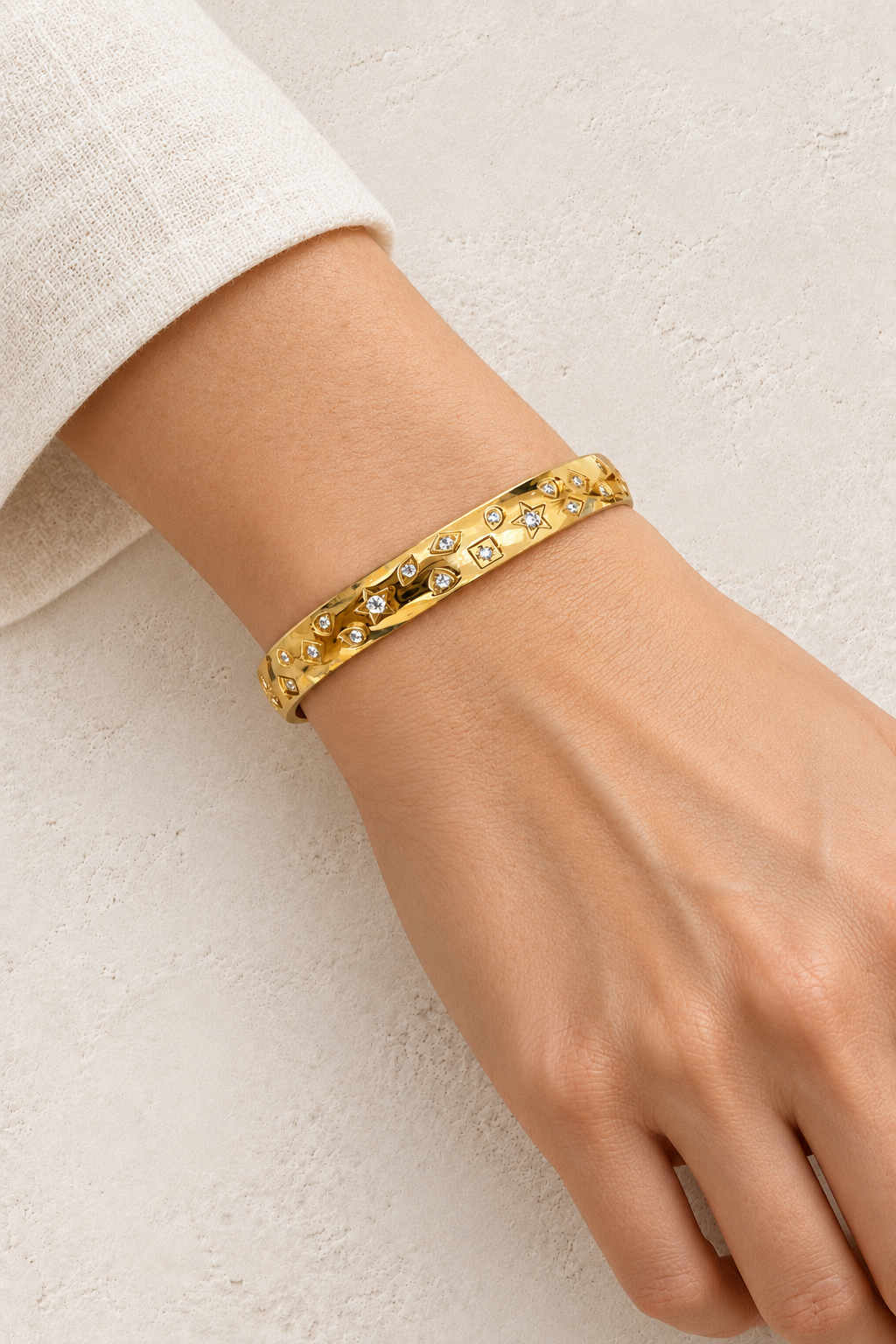 
                  
                    Model wearing Gold Celestial Crystal Bangle | Waterproof
                  
                